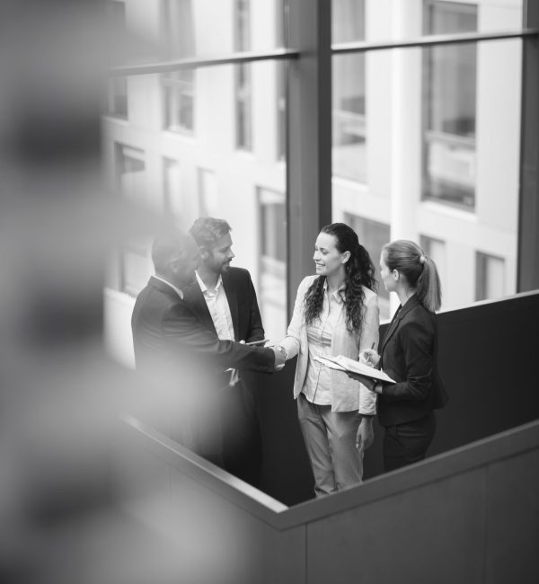 businesspeople-having-discussion-office